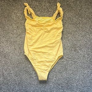 dippin’ daisy’s yellow one piece